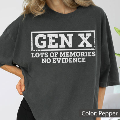 May include: A pepper-colored short-sleeve t-shirt featuring a white rectangular graphic with the text GEN X in a bold font, followed by the text LOTS OF MEMORIES NO EVIDENCE in a smaller, clean sans-serif typeface centered below the box.