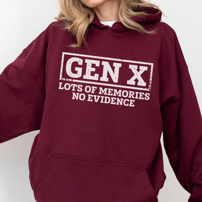 May include: A maroon long-sleeve hooded sweatshirt featuring a white graphic print on the chest. The design includes a rectangular border enclosing the text GEN X, followed by the phrase LOTS OF MEMORIES NO EVIDENCE in a distressed font style.