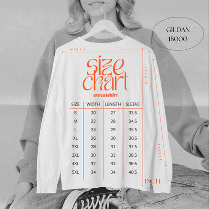 May include: A white long-sleeve sweatshirt size chart featuring orange text and lines. The chart displays measurements in inches for sizes S through 5XL, including width, length, and sleeve length. The text Gildan 18000 is visible in the top right corner.