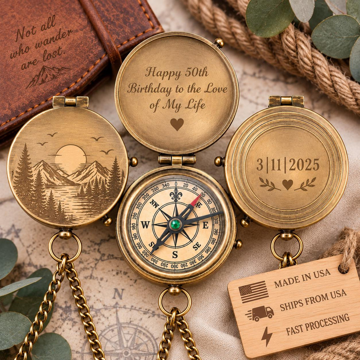 a set of three engraved compass pendants, each with a unique design and inscription. The compass pendants are displayed on a map, surrounded by a rope and some greenery.