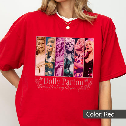 May include: A bright red short-sleeved t-shirt featuring a rectangular graphic print of six different portraits of Dolly Parton. Below the images, the text reads Dolly Parton Country Queen, accompanied by small butterfly and floral line art designs.