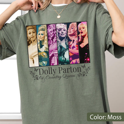 May include: A moss green t-shirt featuring a graphic print of six vertical panels displaying various images of Dolly Parton. Below the panels, the text reads Dolly Parton Country Queen, accompanied by small butterfly and floral illustrations.