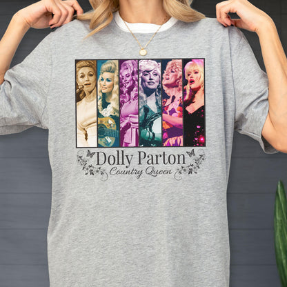May include: A heather gray t-shirt featuring a rectangular graphic with six vertical panels displaying various portraits of Dolly Parton. Below the graphic, the text reads Dolly Parton Country Queen, surrounded by small floral and butterfly illustrations.