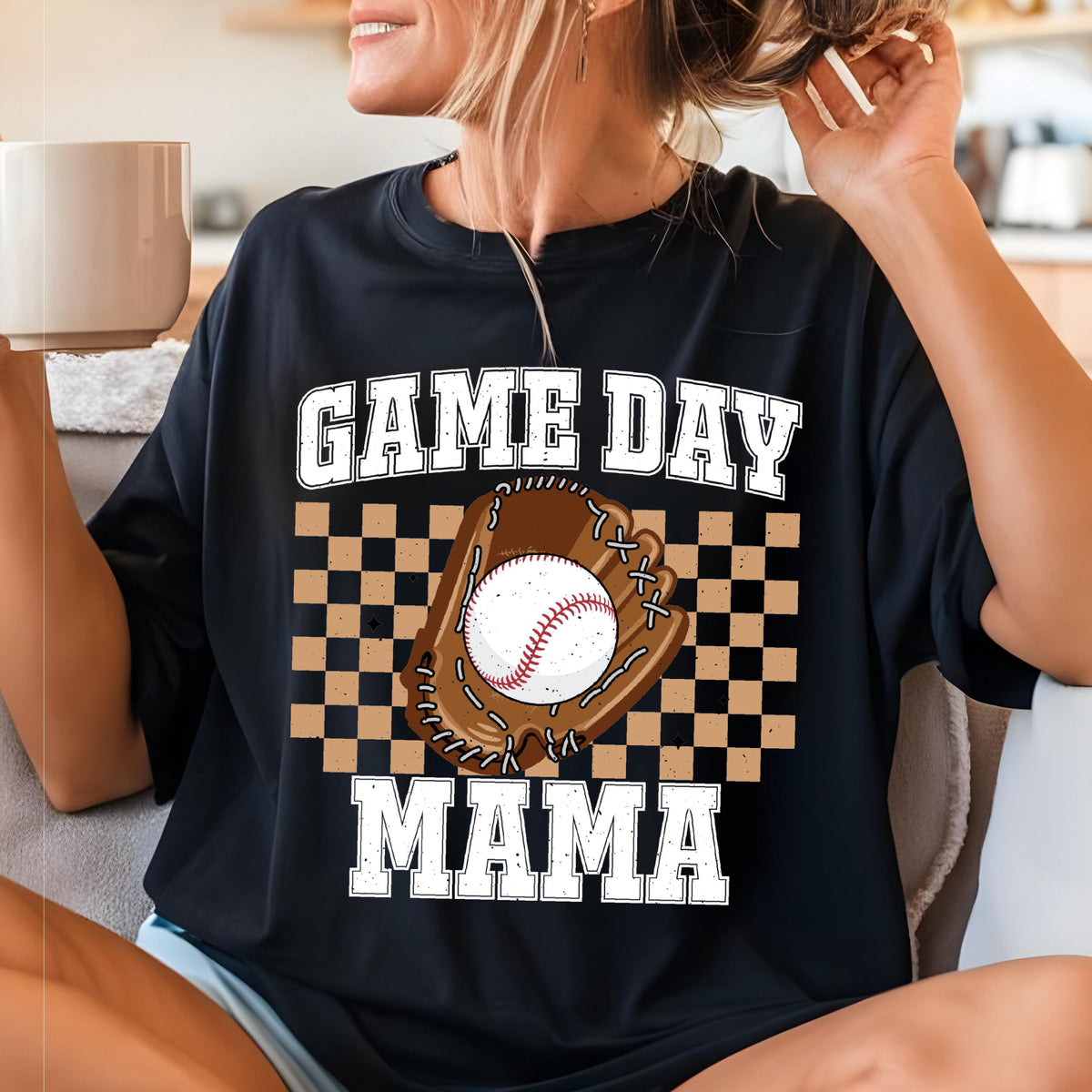 May include: Black t-shirt with a white graphic that says "GAME DAY MAMA" with a baseball and glove illustration.