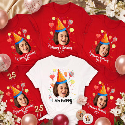 May include: A collection of red and white t-shirts featuring a graphic of a person wearing an orange party hat, surrounded by colorful balloons and confetti. The red shirts display the text Merry's Birthday 25th, while the white shirt says i am merry.