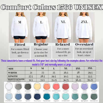 May include: A Comfort Colors 1566 unisex sweatshirt size guide featuring four white sweatshirts labeled M, L, XL, and 2XL. Includes fit descriptions, a sizing chart with width and length in inches, and a color palette of twenty-one fabric swatches.