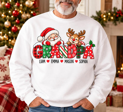 May include: A white crewneck sweatshirt featuring a graphic of Santa Claus and a reindeer peeking over the word GRANDPA in red, green, and white patterns. Below the text are the names Liam, Emma, Mason, and Sophia separated by red hearts.