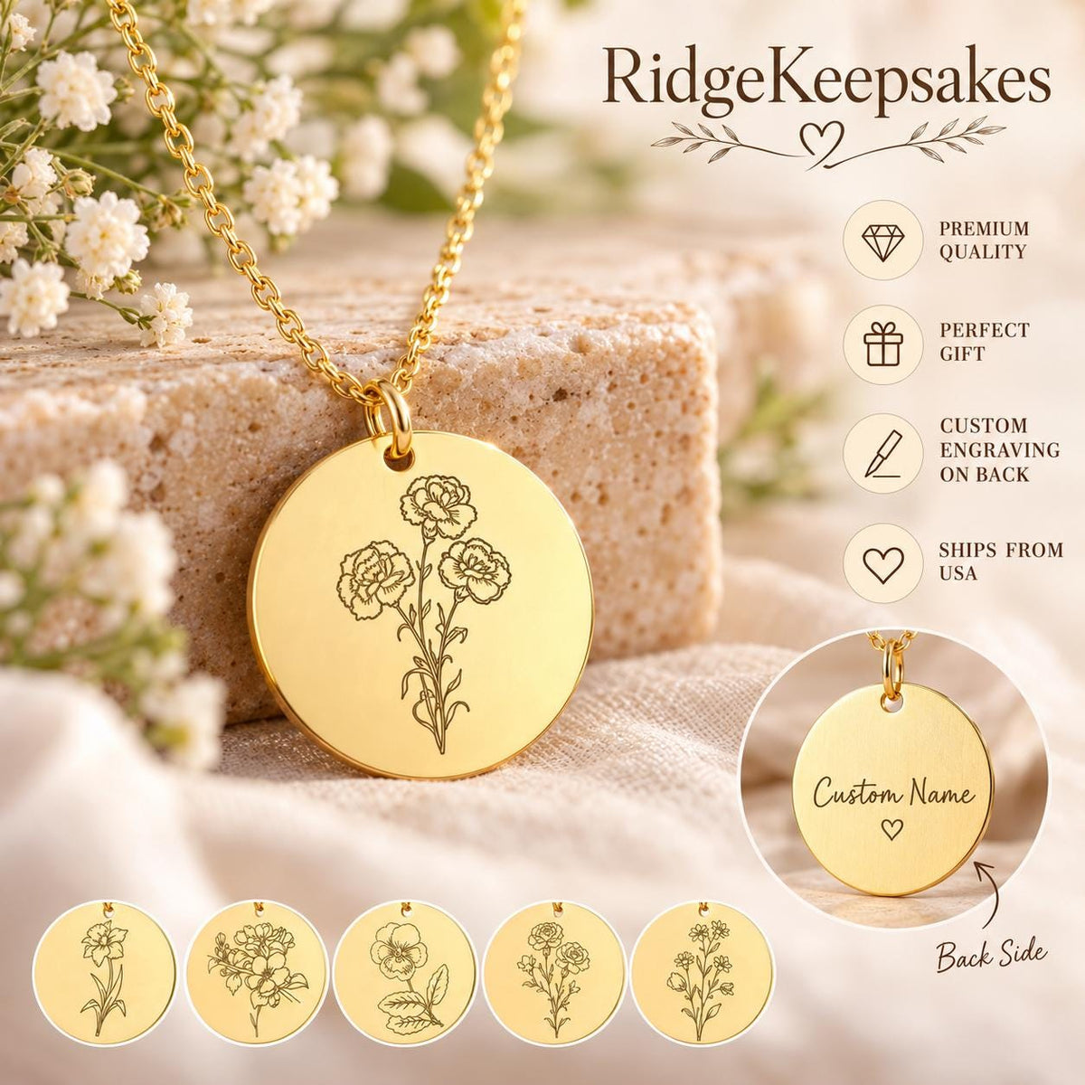Gold-tone disc necklace with a detailed flower engraving, styled on a textured stone block with white flowers and a row of floral pendant designs below.